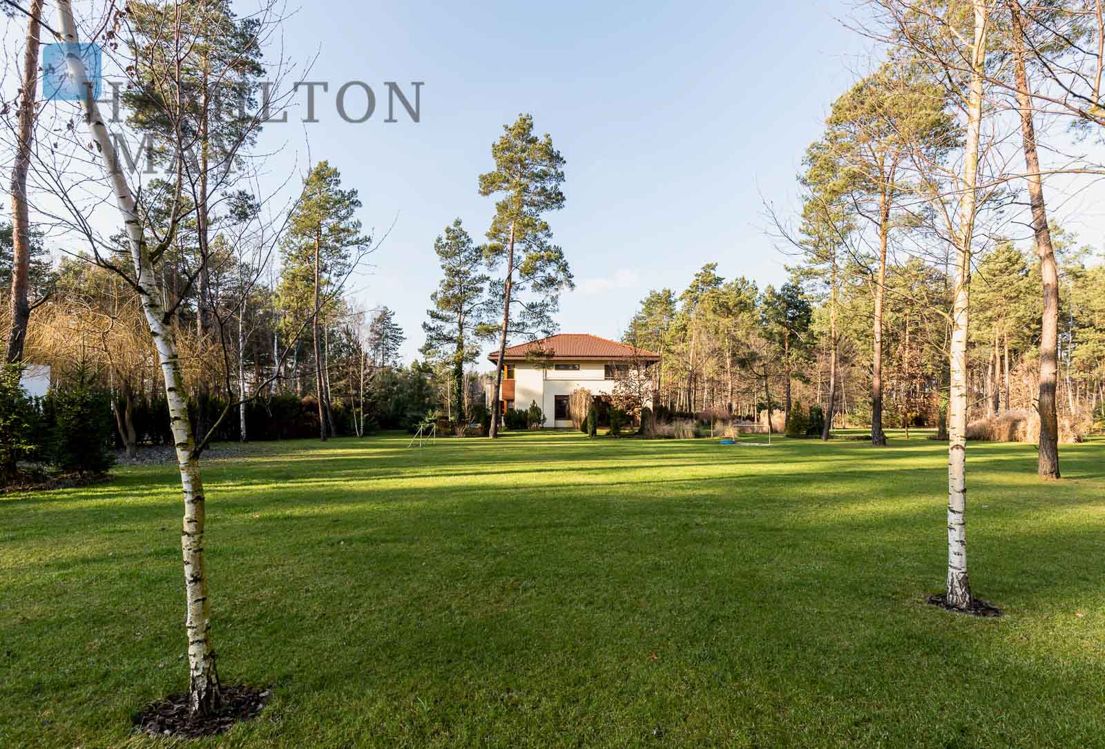 Beautiful, modern and functional single family house located within the gated 'Nad Brzegiem Czarnej' settlement in a forest in Marki, Warsaw Warsaw for rent