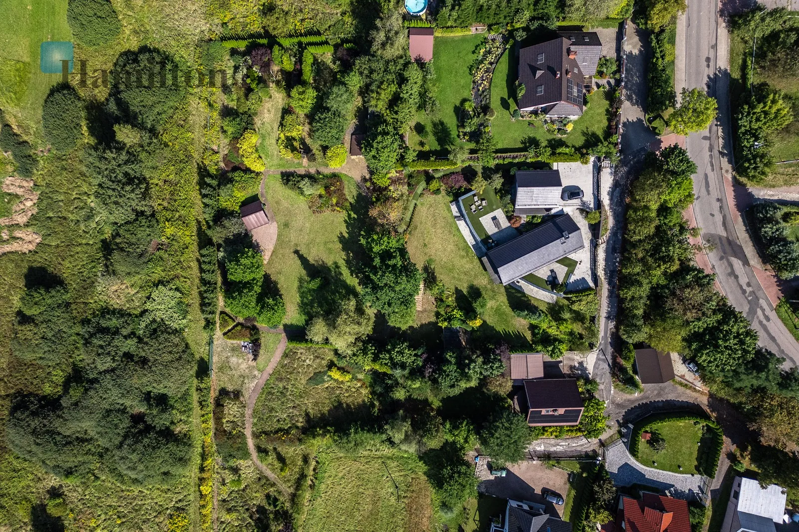 An elegant, atmospheric residence located on a beautiful plot with a panoramic view in Mogilany - slider