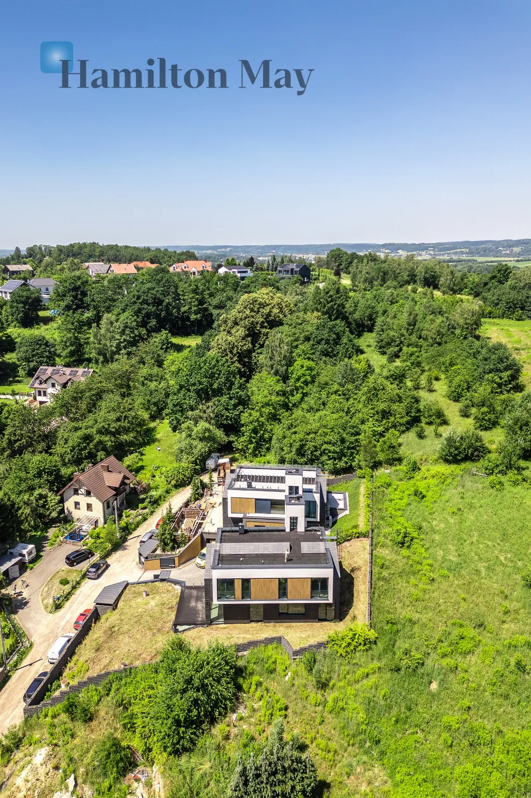 An elegant detached single-family house with an elevator and a unique view of Wola Justowska - slider