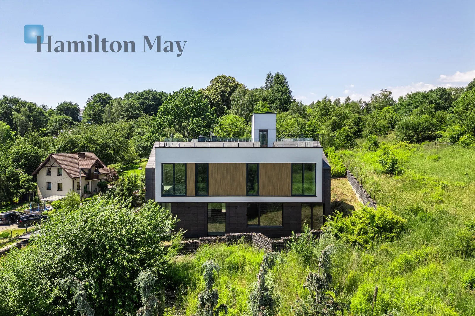 An elegant detached single-family house with an elevator and a unique view of Wola Justowska - slider