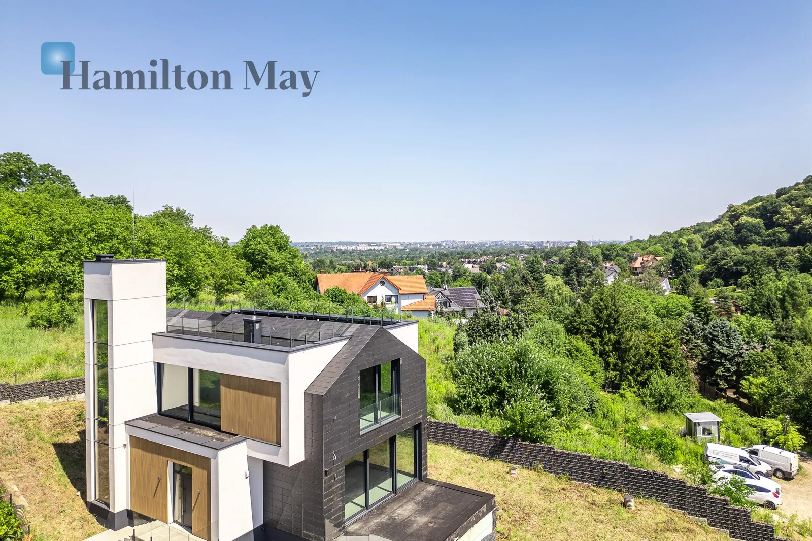 An elegant detached single-family house with an elevator and a unique view of Wola Justowska - slider