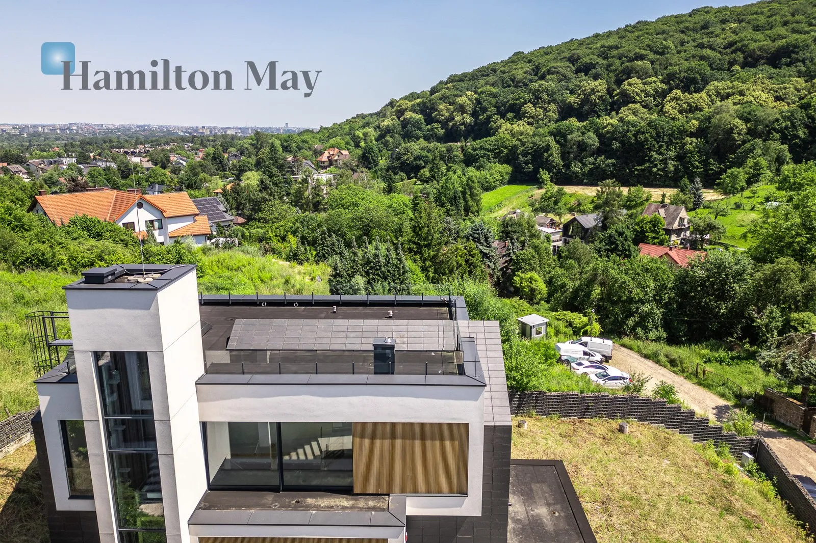 An elegant detached single-family house with an elevator and a unique view of Wola Justowska - slider