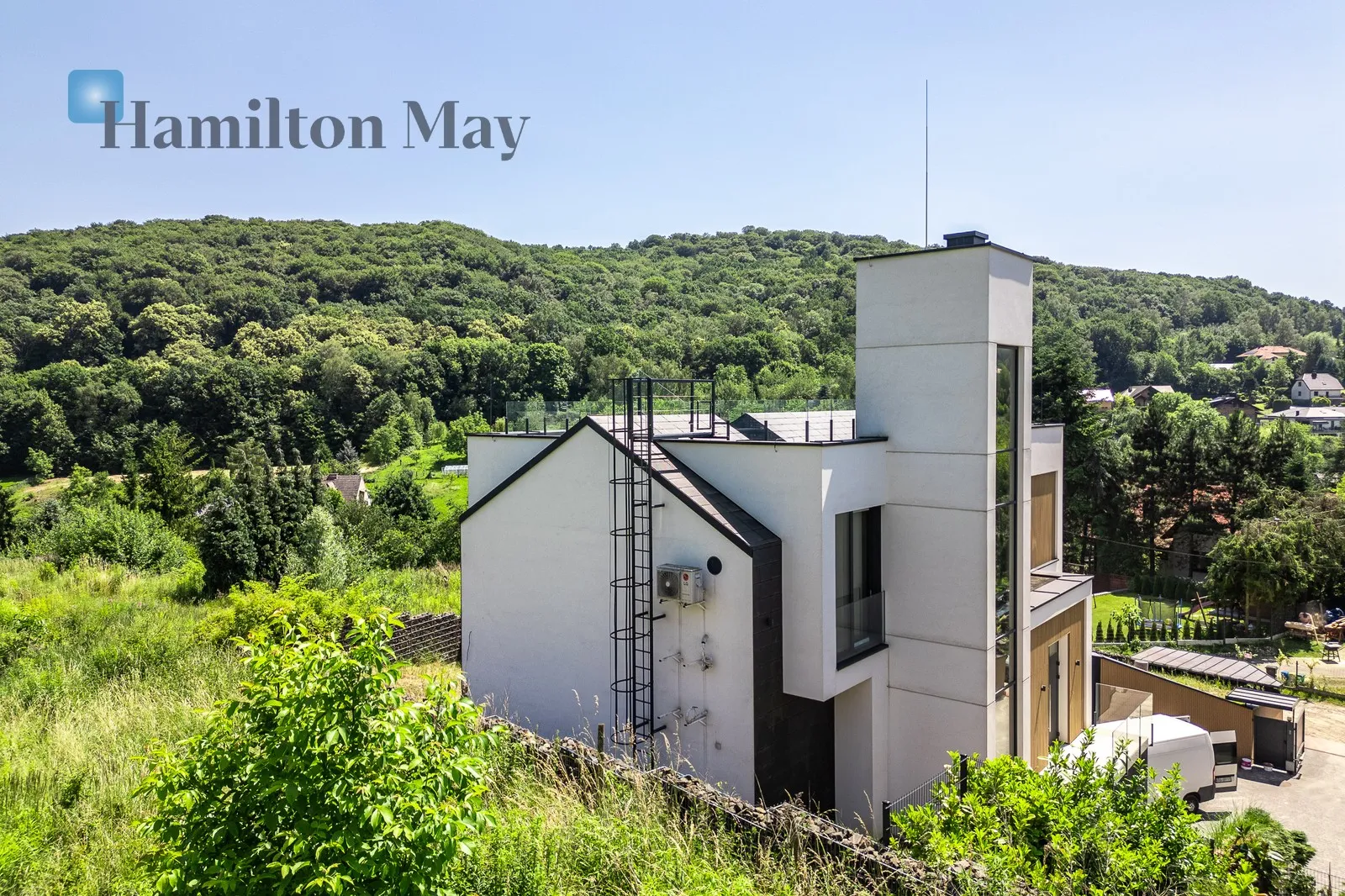 An elegant detached single-family house with an elevator and a unique view of Wola Justowska - slider
