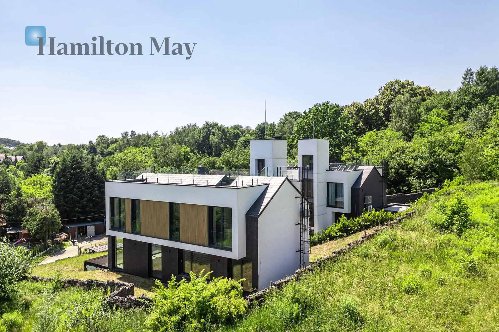 An elegant detached single-family house with an elevator and a unique view of Wola Justowska - slider