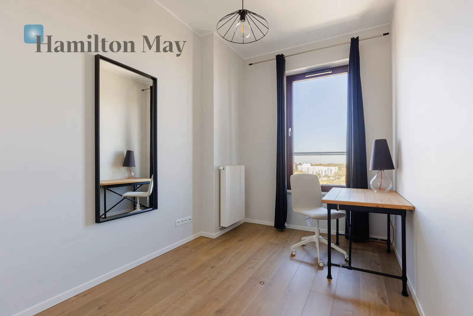 Beautiful, modern, three-room apartment with a balcony overlooking the city skyline - slider
