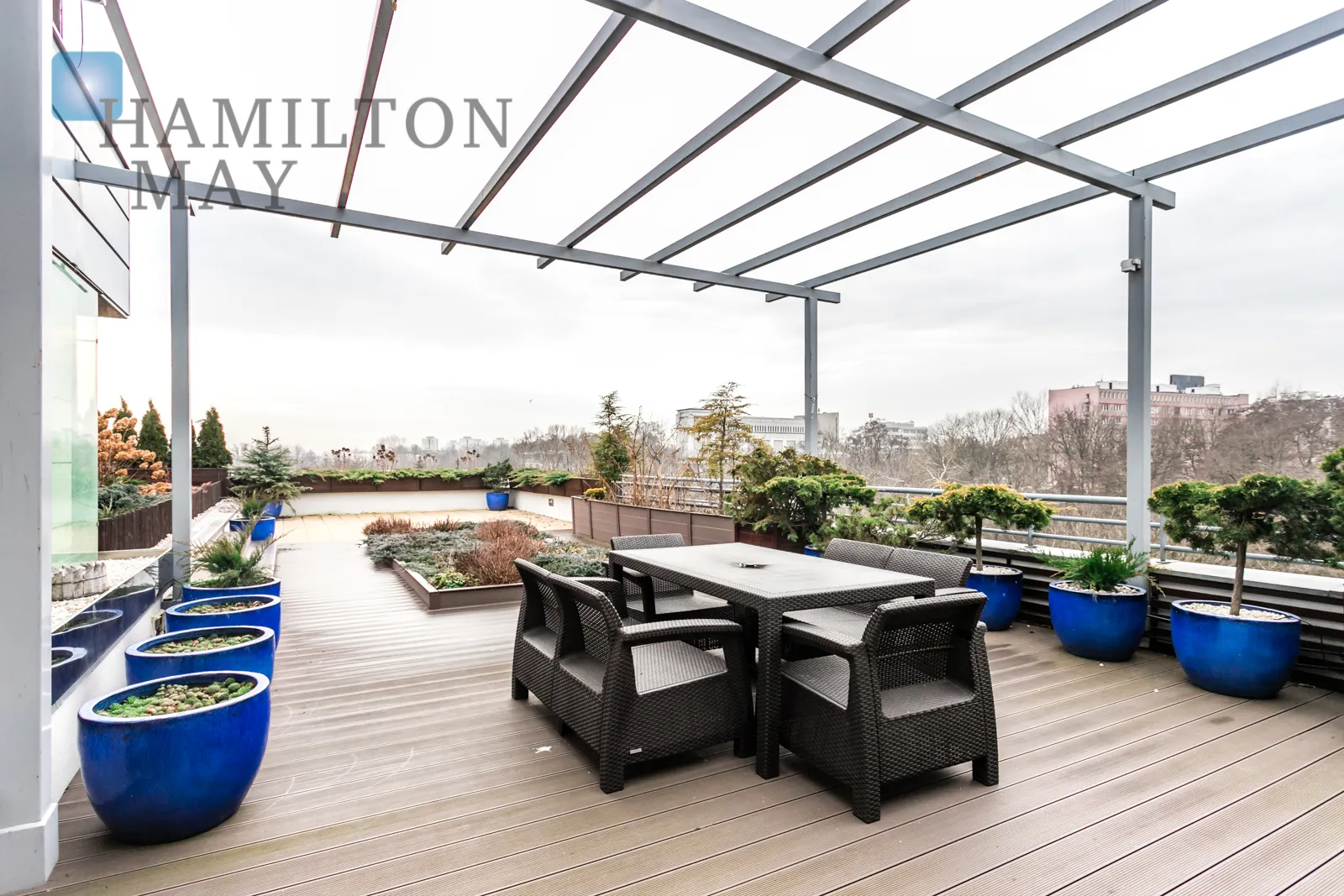 A luxurious penthouse with a large terrace