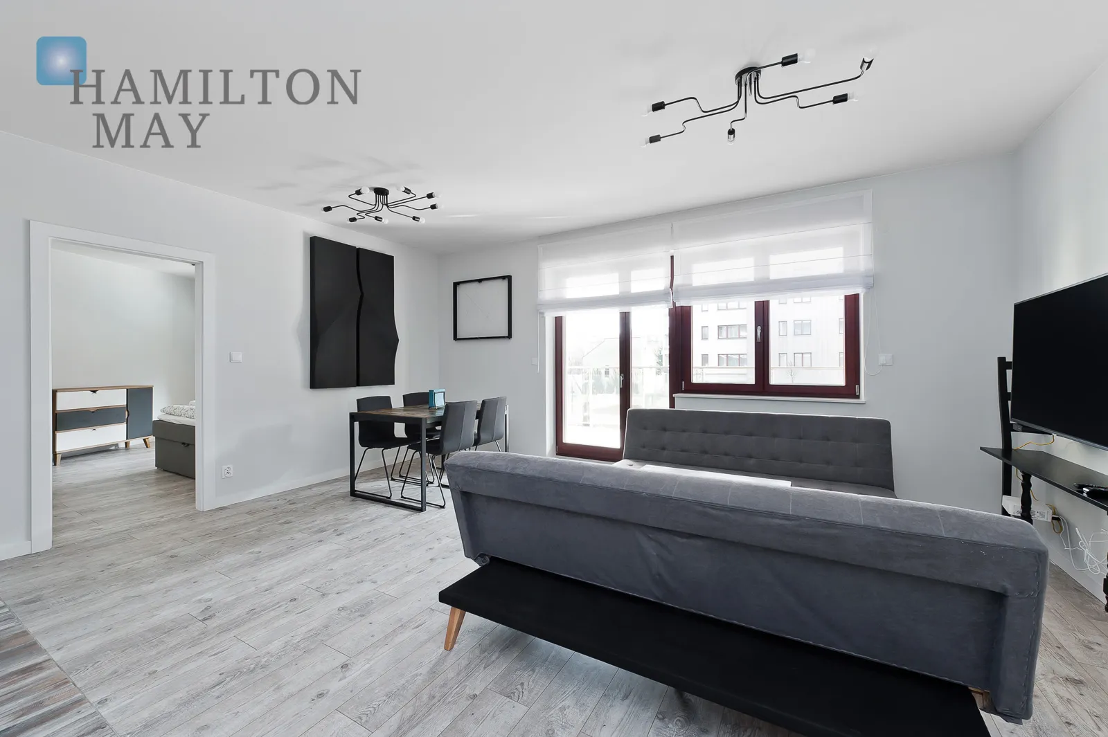 A modern apartment with a terrace in the prestigious Ludwinów development on the Vistula Boulevards - slider