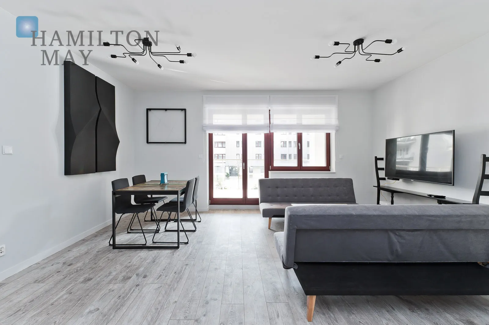 A modern apartment with a terrace in the prestigious Ludwinów development on the Vistula Boulevards - slider