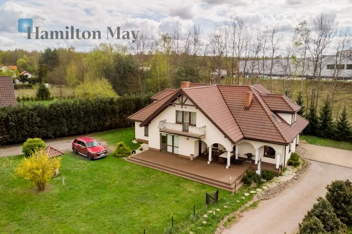 City: Modlniczka Street: Willowa Region: Modlniczka Price: 2490000 PLN Bedrooms: 4 Bathrooms: 3 Plot size: 3100m2 Price/m2: 6898 PLN - slider